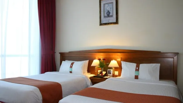 Hotel Holiday International photo 2